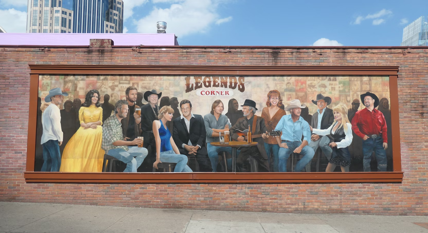 Mural con leyendas de la música country.